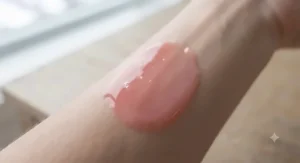 Close-up of the rich, glossy texture of the best lip mask on skin.